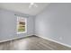 Bedroom featuring vaulted ceilings, a ceiling fan, and a view of the front yard at 2181 Jessa Dr, Kissimmee, FL 34743