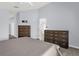 Spacious bedroom featuring two large dressers and an ensuite bathroom entrance at 2181 Jessa Dr, Kissimmee, FL 34743