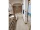 Clean bathroom featuring a tiled shower, neutral-toned walls and tile flooring at 2320 Ne 43Rd St, Ocala, FL 34479