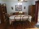 Cozy dining area with hardwood floors, decorative accents, and a view of the outdoors at 2320 Ne 43Rd St, Ocala, FL 34479