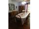 Cozy dining room featuring hardwood floors and sliding glass doors providing plenty of light at 2320 Ne 43Rd St, Ocala, FL 34479