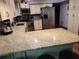 Well-equipped kitchen featuring granite countertops and stainless steel appliances at 2320 Ne 43Rd St, Ocala, FL 34479
