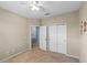 Bedroom featuring neutral walls, carpet, and a ceiling fan with an integrated lighting fixture at 2560 Hayden Valley Street, Apopka, FL 32703