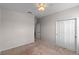Bedroom with carpeted floors and standard closet doors at 2560 Hayden Valley Street, Apopka, FL 32703