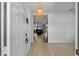 Bright and inviting foyer with tile flooring and a view into the living area at 2560 Hayden Valley Street, Apopka, FL 32703