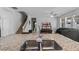 Modern kitchen with a granite island and view into living area at 2560 Hayden Valley Street, Apopka, FL 32703