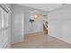 Clean living room with tile flooring, neutral walls and modern lighting at 2560 Hayden Valley Street, Apopka, FL 32703