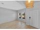 Inviting living room with tile flooring, neutral walls, and natural light at 2560 Hayden Valley Street, Apopka, FL 32703