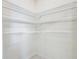 Well-organized walk-in pantry with multiple shelves, offering ample storage space at 313 Sofia Ln, Lake Alfred, FL 33850
