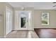 Foyer features tiled flooring, a glass front door, and a closet for extra storage at 3322 Park Branch Ave, Clermont, FL 34711
