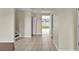 Inviting hallway with tile flooring and natural light at 3322 Park Branch Ave, Clermont, FL 34711