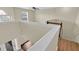 Bright hallway with wood flooring and high ceilings featuring views of the stairs and the front door at 3322 Park Branch Ave, Clermont, FL 34711