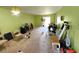 Spacious living room awaiting personal touches with lots of natural light and a sliding door to the balcony at 333 Lake Howard Nw Dr # 201A, Winter Haven, FL 33880
