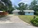 Charming single-story home with a long driveway and well-maintained lawn at 3695 Dale Ct, Mount Dora, FL 32757