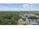 Community aerial view showing tree coverage and neighborhood layout at 419 Cierra Oaks Cir, Lady Lake, FL 32159
