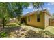 House's backyard showing partial grass and a wood privacy fence at 419 Cierra Oaks Cir, Lady Lake, FL 32159