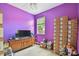 Bedroom filled with boxes with a window for natural light at 419 Cierra Oaks Cir, Lady Lake, FL 32159