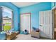 Bedroom featuring a window with views of the front yard and a closet at 419 Cierra Oaks Cir, Lady Lake, FL 32159