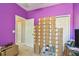 Bedroom featuring purple walls and stacks of boxes at 419 Cierra Oaks Cir, Lady Lake, FL 32159