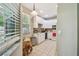 Compact kitchen featuring white cabinets, tile backsplash, and essential appliances at 419 Cierra Oaks Cir, Lady Lake, FL 32159