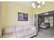 Welcoming living room showcasing a cream-colored sofa and French doors at 419 Cierra Oaks Cir, Lady Lake, FL 32159
