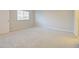 Light and airy bedroom with neutral carpet, and a window with natural light at 463 Cape Honeysuckle Pl, Sanford, FL 32771
