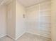 Walk-in closet featuring ample storage with wire shelving at 463 Cape Honeysuckle Pl, Sanford, FL 32771