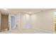 Hallway with neutral carpet leading to other rooms at 463 Cape Honeysuckle Pl, Sanford, FL 32771