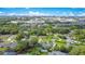 Beautiful neighborhood provides a serene backdrop for this home featuring mature trees, lush greenery, and close city proximity at 6317 Cheryl St, Orlando, FL 32819