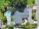 A manicured private oasis with a pool is showcased in this aerial view of the beautiful property at 6317 Cheryl St, Orlando, FL 32819
