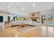 Bright living area with fireplace, modern furniture, and large windows overlooking the pool at 6317 Cheryl St, Orlando, FL 32819