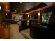 Home theater with large screen, tiered seating, and starry night ceiling at 6317 Cheryl St, Orlando, FL 32819