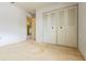 A bright bedroom with a closet offering ample storage space at 708 Duffer Ln, Kissimmee, FL 34759