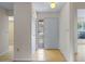 Entryway featuring tile floors, a coat closet, and a door with decorative glass insert at 708 Duffer Ln, Kissimmee, FL 34759