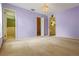 Spacious main bedroom with connections to the bathroom and walk in closet at 708 Duffer Ln, Kissimmee, FL 34759