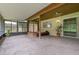 Large screened porch with hot tub for relaxation and enjoying the outdoors at 708 Duffer Ln, Kissimmee, FL 34759
