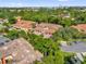 Community aerial view of the neighborhood featuring lush landscaping and well-maintained grounds at 7421 Sugar Bend Dr # 7421, Orlando, FL 32819