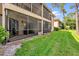 Spacious screened in back patio with a lawn view at 7421 Sugar Bend Dr # 7421, Orlando, FL 32819