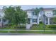 Charming home with a cozy front porch and well-maintained landscaping at 9069 Pinch Shot Dr, Winter Garden, FL 34787