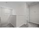 Upstairs hallway with carpeted floors, a window and a view into another room at 9069 Pinch Shot Dr, Winter Garden, FL 34787