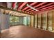 This basement features unfinished walls, concrete floors, a window, and fluorescent lighting at 9536 Peer Dr, Orlando, FL 32817