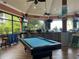 Community bar and entertainment area featuring a pool table, comfortable seating, and big-screen tv's at 1109 New Providence # 141109, Davenport, FL 33897