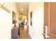 Entryway with wood floors leads to an open dining and living area at 1109 New Providence # 141109, Davenport, FL 33897