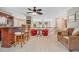 Bonus room features a wet bar, comfy seating, carpet, and lots of space at 14244 Nottingham Way Cir, Orlando, FL 32828