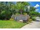 Recreation Complex sign surrounded by landscaping and mature trees, creating a welcoming entrance at 14244 Nottingham Way Cir, Orlando, FL 32828