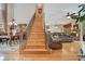 Inviting foyer featuring a staircase leading to the upper level, complemented by an open living area at 14244 Nottingham Way Cir, Orlando, FL 32828