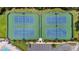Overhead view of the community's well maintained tennis courts with adjacent parking at 14244 Nottingham Way Cir, Orlando, FL 32828