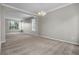 Dining room featuring chandelier lighting, wainscotting, and archways at 14342 Fieldstone Lake Way, Orlando, FL 32824