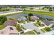 A high angle shot shows houses on a cul-de-sac with a screened pool and easy highway access at 1606 Burryport Dr, Orlando, FL 32837