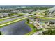 Stunning aerial view of a lakeside community with easy highway access and lush landscaping at 1606 Burryport Dr, Orlando, FL 32837